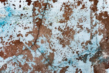 Çatlakları ve çizikleri olan beton bir duvarın dokusu arka plan olarak kullanılabilir.