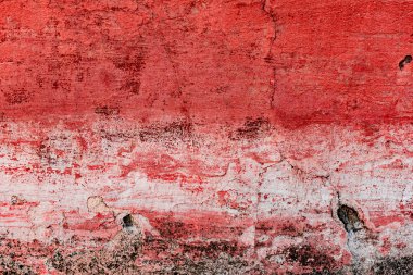 Çatlakları ve çizikleri olan beton bir duvarın dokusu arka plan olarak kullanılabilir.