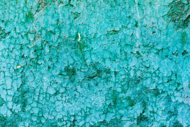 Çatlakları ve çizikleri olan beton bir duvarın dokusu arka plan olarak kullanılabilir.