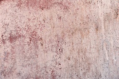 Çatlakları ve çizikleri olan beton bir duvarın dokusu arka plan olarak kullanılabilir.
