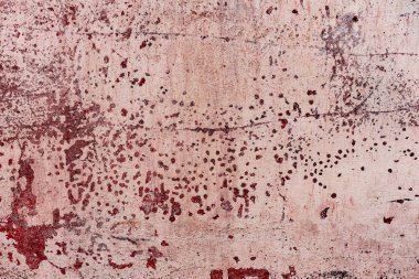 Çatlakları ve çizikleri olan beton bir duvarın dokusu arka plan olarak kullanılabilir.