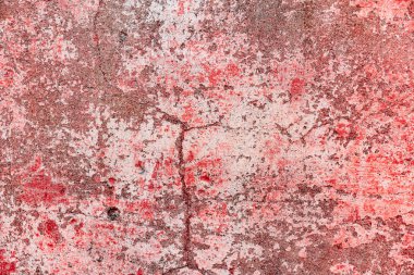 Çatlakları ve çizikleri olan beton bir duvarın dokusu arka plan olarak kullanılabilir.