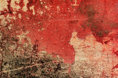 Çatlakları ve çizikleri olan beton bir duvarın dokusu arka plan olarak kullanılabilir.