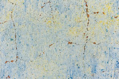 Çatlakları ve çizikleri olan beton bir duvarın dokusu arka plan olarak kullanılabilir.