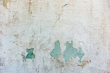 Çatlakları ve çizikleri olan beton bir duvarın dokusu arka plan olarak kullanılabilir.