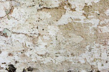 Çatlakları ve çizikleri olan beton bir duvarın dokusu arka plan olarak kullanılabilir.