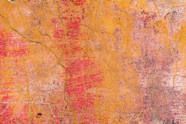 Çatlakları ve çizikleri olan beton bir duvarın dokusu arka plan olarak kullanılabilir.