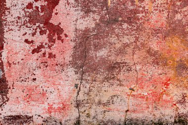 Çatlakları ve çizikleri olan beton bir duvarın dokusu arka plan olarak kullanılabilir.