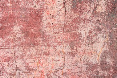 Çatlakları ve çizikleri olan beton bir duvarın dokusu arka plan olarak kullanılabilir.