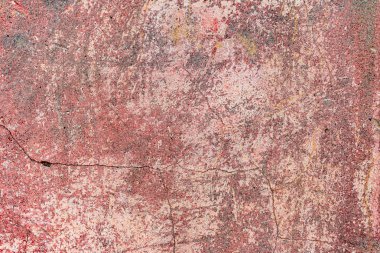 Çatlakları ve çizikleri olan beton bir duvarın dokusu arka plan olarak kullanılabilir.