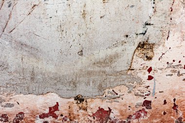 Çatlakları ve çizikleri olan beton bir duvarın dokusu arka plan olarak kullanılabilir.