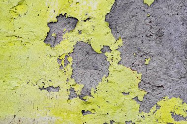 Çatlakları ve çizikleri olan beton bir duvarın dokusu arka plan olarak kullanılabilir.