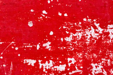 Çatlakları ve çizikleri olan beton bir duvarın dokusu arka plan olarak kullanılabilir.