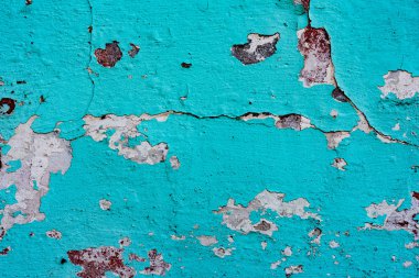 Çatlakları ve çizikleri olan beton bir duvarın dokusu arka plan olarak kullanılabilir.