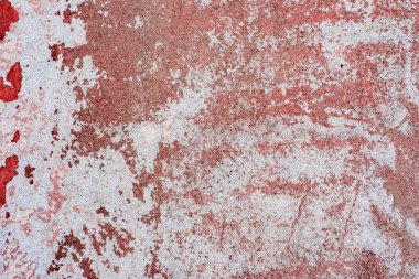 Çatlakları ve çizikleri olan beton bir duvarın dokusu arka plan olarak kullanılabilir.