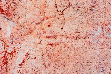 Çatlakları ve çizikleri olan beton bir duvarın dokusu arka plan olarak kullanılabilir.