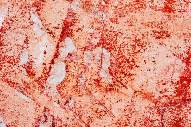 Çatlakları ve çizikleri olan beton bir duvarın dokusu arka plan olarak kullanılabilir.