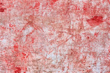 Çatlakları ve çizikleri olan beton bir duvarın dokusu arka plan olarak kullanılabilir.