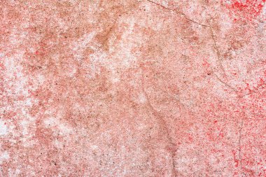 Çatlakları ve çizikleri olan beton bir duvarın dokusu arka plan olarak kullanılabilir.