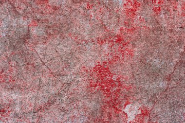 Çatlakları ve çizikleri olan beton bir duvarın dokusu arka plan olarak kullanılabilir.