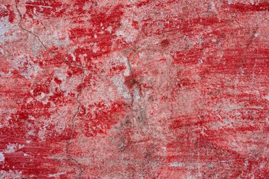 Çatlakları ve çizikleri olan beton bir duvarın dokusu arka plan olarak kullanılabilir.