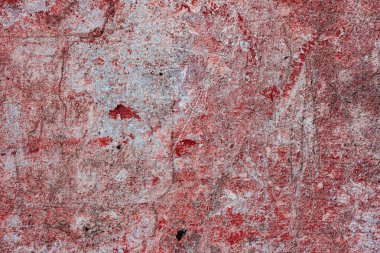 Çatlakları ve çizikleri olan beton bir duvarın dokusu arka plan olarak kullanılabilir.