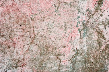 Çatlakları ve çizikleri olan beton bir duvarın dokusu arka plan olarak kullanılabilir.