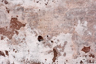 Çatlakları ve çizikleri olan beton bir duvarın dokusu arka plan olarak kullanılabilir.