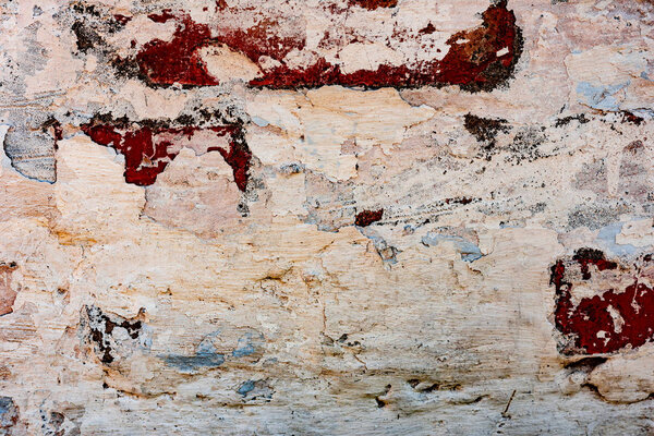 Texture of a concrete wall with cracks and scratches which can be used as a background