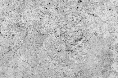 Çatlakları ve çizikleri olan beton bir duvarın dokusu arka plan olarak kullanılabilir.