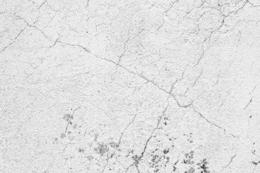 Çatlakları ve çizikleri olan beton bir duvarın dokusu arka plan olarak kullanılabilir.