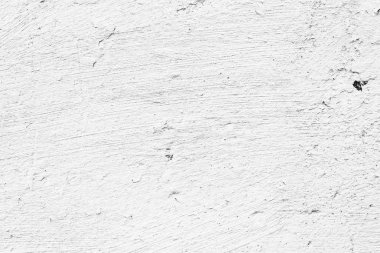 Çatlakları ve çizikleri olan beton bir duvarın dokusu arka plan olarak kullanılabilir.