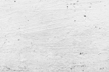 Çatlakları ve çizikleri olan beton bir duvarın dokusu arka plan olarak kullanılabilir.