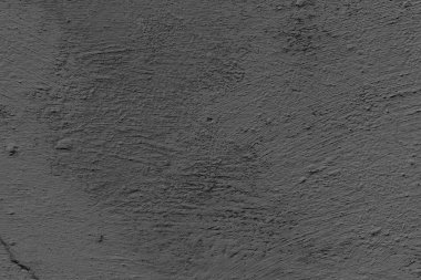 Çatlakları ve çizikleri olan beton bir duvarın dokusu arka plan olarak kullanılabilir.