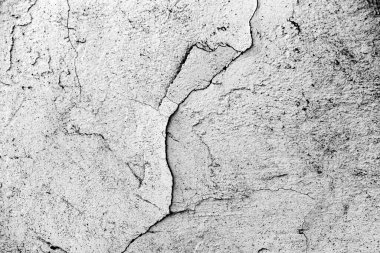 Doku, duvar, beton, arka plan olarak kullanılabilir. Çizik ve çatlaklarla dolu bir duvar parçası.