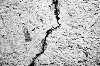 Arkaplan için gri ve beyaz renklerde sanat betonu veya taş dokusu. Çimento ve tonlama vintage kum duvar