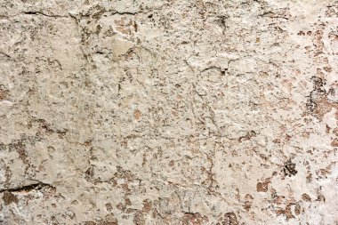 Doku, duvar, beton, arka plan olarak kullanılabilir. Çizik ve çatlaklarla dolu bir duvar parçası.