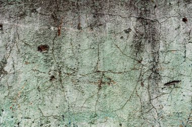 Doku, duvar, beton, arka plan olarak kullanılabilir. Çizik ve çatlaklarla dolu bir duvar parçası.
