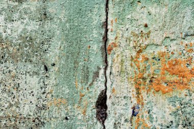 Doku, duvar, beton, arka plan olarak kullanılabilir. Çizik ve çatlaklarla dolu bir duvar parçası.