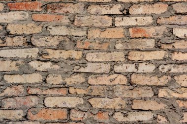 Doku, tuğla, duvar, arka plan olarak kullanılabilir. Çizik ve çatlaklarla tuğla dokusu