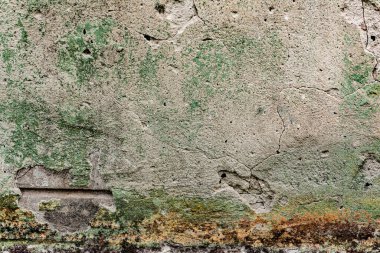 Doku, duvar, beton, arka plan olarak kullanılabilir. Çizik ve çatlaklarla dolu bir duvar parçası.