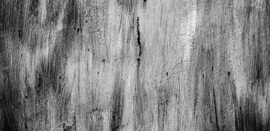 Çatlakları ve çizikleri olan metal bir duvarın dokusu arka plan olarak kullanılabilir.