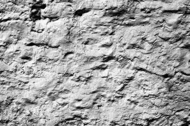 Doku, duvar, beton, arka plan olarak kullanılabilir. Çizik ve çatlaklarla dolu bir duvar parçası.