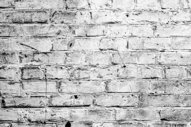 Hasarlı beyaz boya katmanlı eski tuğla duvar, yakın plan fotoğraf dokusu