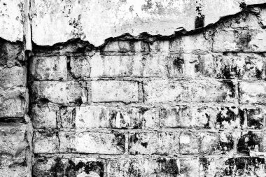 Hasarlı beyaz boya katmanlı eski tuğla duvar, yakın plan fotoğraf dokusu