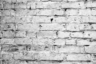 Hasarlı beyaz boya katmanlı eski tuğla duvar, yakın plan fotoğraf dokusu