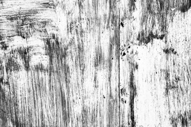 Çatlakları ve çizikleri olan metal bir duvarın dokusu arka plan olarak kullanılabilir.