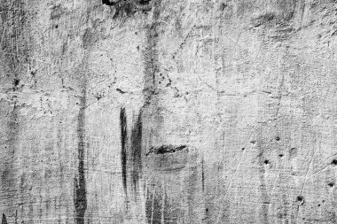 Doku, duvar, beton, arka plan olarak kullanılabilir. Çizik ve çatlaklarla dolu bir duvar parçası.