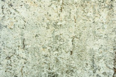 Doku, duvar, beton, arka plan olarak kullanılabilir. Çizik ve çatlaklarla dolu bir duvar parçası.