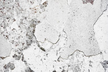 Doku, duvar, beton, arka plan olarak kullanılabilir. Çizik ve çatlaklarla dolu bir duvar parçası.